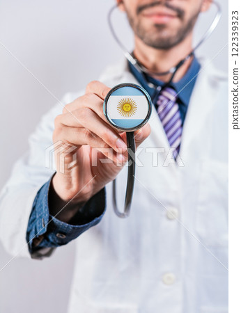 Argentina health and medical insurance concept. Healthcare System Argentina, doctor holding sthetoscope 122339323