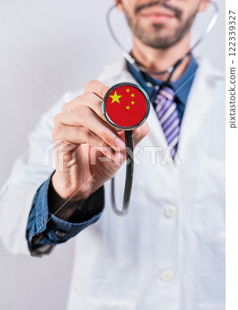 China health and medical insurance concept. Chinese Healthcare System, doctor holding stethoscope 122339327