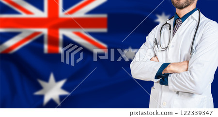 Male Doctor holding stethoscope on Australian flag. Doctor with stethoscope on Australia flag Male Doctor holding stethoscope on Australian flag. Doctor with stethoscope on Australia flag 122339347