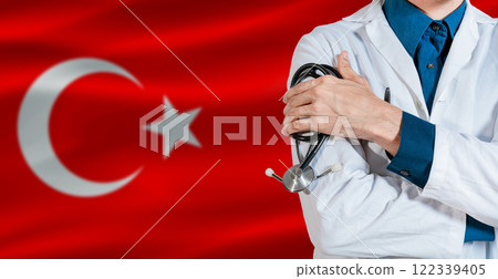 Doctor with stethoscope on Turkey flag. Doctor holding stethoscope on Turkey flag 122339405