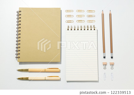 Notebooks with stationery on a white background Notebooks with stationery on a white background 122339513