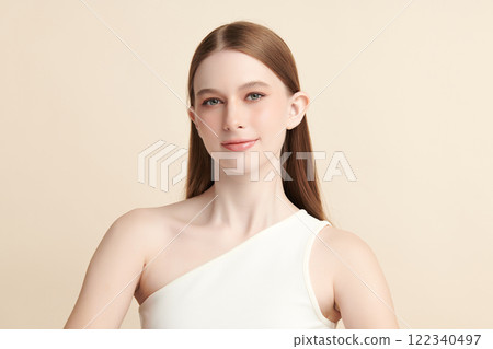 Beautiful young woman with clean fresh skin on beige background, Face care, Facial treatment, Cosmetology, beauty and spa, women portrait. 122340497
