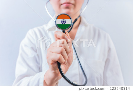 Doctor holding stethoscope with India flag. National Health System of India 122340514