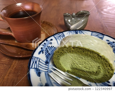 Matcha cake and coffee at a traditional Japanese cafe Matcha cake and coffee at a traditional Japanese cafe 122340997