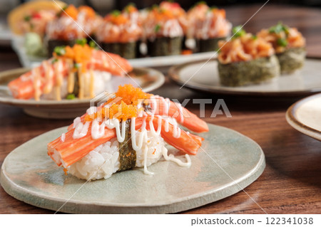 Crab Stick Sushi with Mayonnaise Sauce with Sushi Set Including Nigiri and Maki 122341038