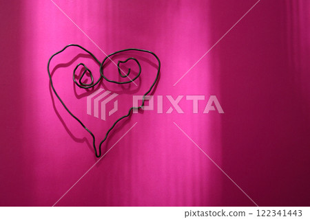 Heart made of wire, Valentine's Day background Heart made of wire, Valentine's Day background 122341443