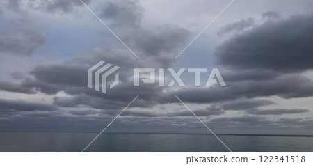 Rain clouds and the sea Rain clouds and the sea 122341518