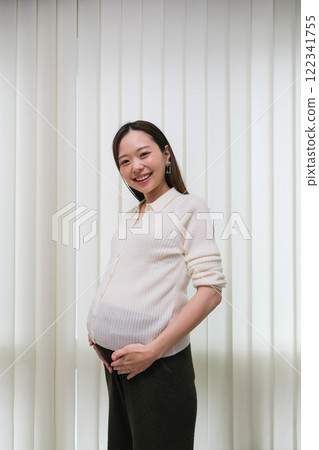 Portrait of smiling pregnant woman Portrait of smiling pregnant woman 122341755