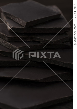Broken bar of dark chocolate Broken bar of dark chocolate 122341913