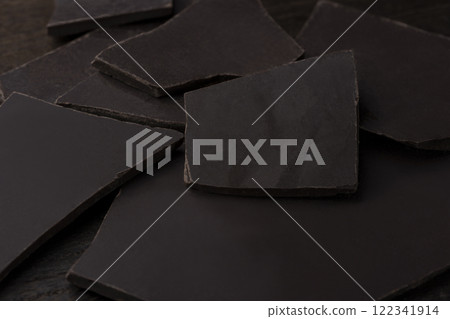 Broken bar of dark chocolate 122341914