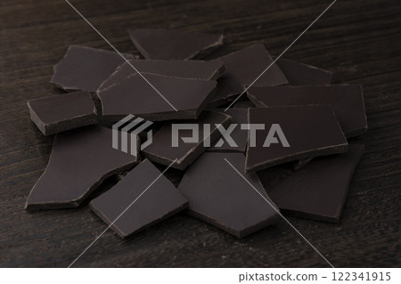 Broken bar of dark chocolate Broken bar of dark chocolate 122341915