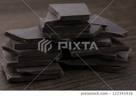 Broken bar of dark chocolate Broken bar of dark chocolate 122341916
