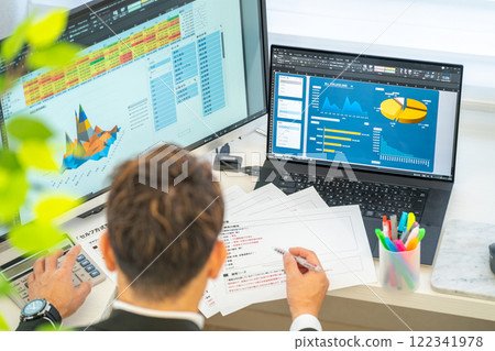 Male engineer business plan analysis graph businessman 1 person 122341978