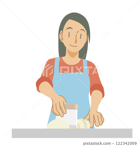 A woman cutting bread dough with a scraper 122342009