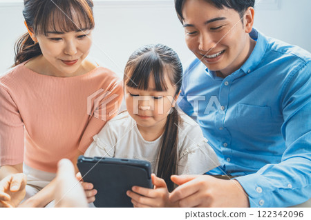 Elementary school students and tablets Elementary school students and tablets 122342096