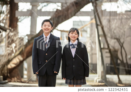 Smiling men and women in school uniforms Smiling men and women in school uniforms 122342431