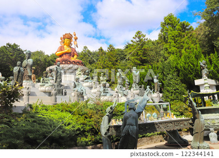 Golden Buddha statue at Beomeosa Temple complex, Busan, South Korea. Buddha and Bodhisattva figures in Beomeosa Temple, Busan, Republic of Korea 122344141