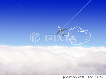 Horizontal nature background with aircraft and Jet trailing smoke in sky. Airplane drawing a heart in sky. Jet flight route of aircraft in shape of a heart in blue sky. Concept of love of travelling 122344152