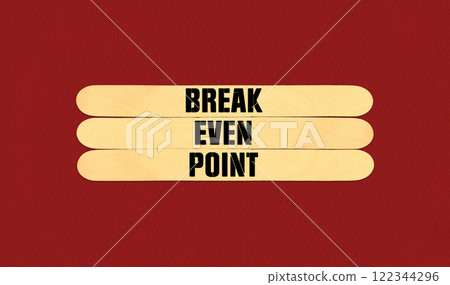 Concept word Break Even Point on beautiful wooden stick. Beautiful Red Chart Paper Background. Business and Break Even Point concept. Copy space Concept word Break Even Point on beautiful wooden stick. Beautiful Red Chart Paper Background. Business and Break Even Point concept. Copy space 122344296