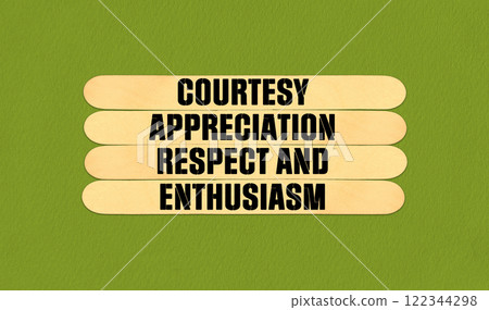 Concept word CARE Courtesy Appreciation Respect and Enthusiasm on beautiful wooden stick. Beautiful Green Chart Paper Background. Business and Courtesy Appreciation Respect and Enthusiasm concept. 122344298