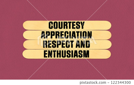 Concept word CARE Courtesy Appreciation Respect and Enthusiasm on beautiful wooden stick. Beautiful Pink Chart Paper Background. Business and Courtesy Appreciation Respect and Enthusiasm concept. 122344300