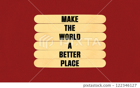 Make a Better World Symbol. Concept word Make The World A Better Place on beautiful wooden stick. Beautiful Red Chart Paper Background. Business and Make a Better World concept. Copy space Make a Better World Symbol. Concept word Make The World A Better Place on beautiful wooden stick. Beautiful Red Chart Paper Background. Business and Make a Better World concept. Copy space 122346127
