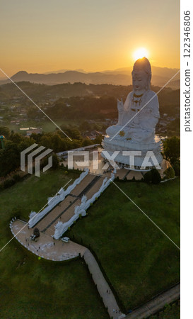 Aerial view of Big Guanyin statue in Wat Huay Pla Kang temple in Chiang Rai province of Thailand during sunset. This temple is a big complex made in Chinese style.  122346806