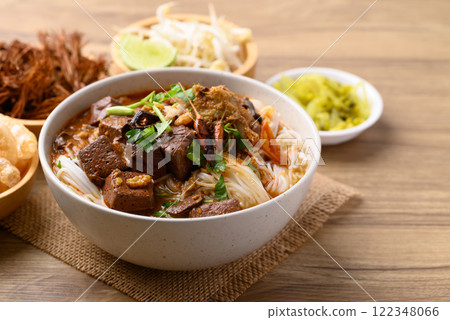 Northern Thai food, Spicy rice noodles soup with pork eating with fresh vegetables, Local Thai food Northern Thai food, Spicy rice noodles soup with pork eating with fresh vegetables, Local Thai food 122348066