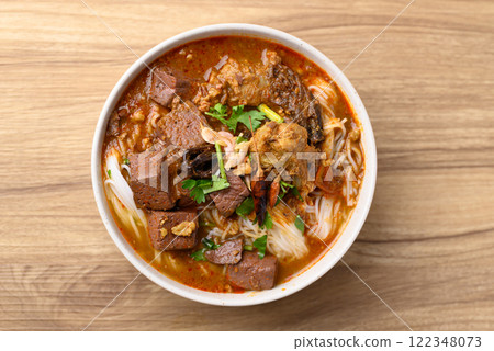 Northern Thai food, Spicy rice noodles soup with pork eating with fresh vegetables, Local Thai food Northern Thai food, Spicy rice noodles soup with pork eating with fresh vegetables, Local Thai food 122348073