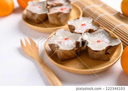 Sticky rice cake with coconut filling on white background, Chinese New Year cake Sticky rice cake with coconut filling on white background, Chinese New Year cake 122348103