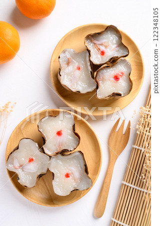 Sticky rice cake with coconut filling on white background, Chinese New Year cake 122348105