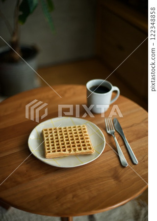 Hot coffee and homemade waffles for snack 122348858