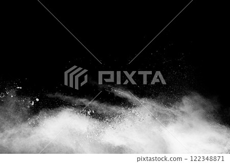 White powder explosion isolated on black background.White dust particles splash. White powder explosion isolated on black background.White dust particles splash. 122348871