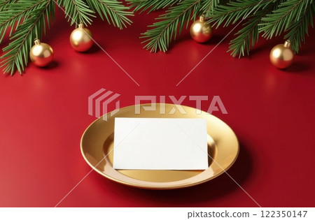 Gold plate with postcard for text on red background, with fir branches Gold plate with postcard for text on red background, with fir branches 122350147
