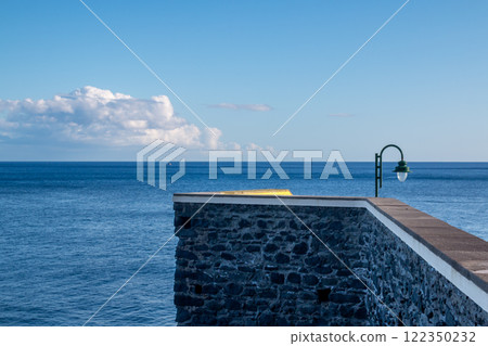 Stone bridge and Atlantic ocean, Madeira, Portugal Stone bridge and Atlantic ocean, Madeira, Portugal 122350232
