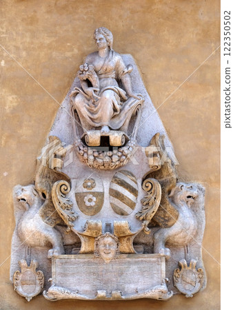 Bass relief on the wall of Palazzo Ragione in Piazza dei Signori in Verona, Italy 122350502
