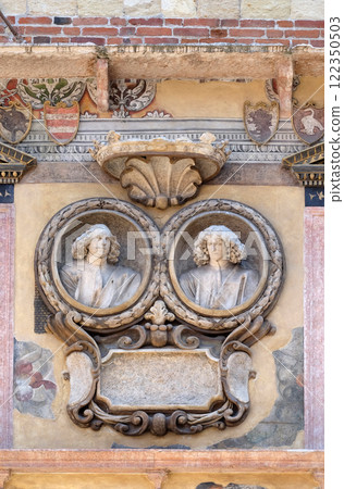 Bass relief on the wall of Palazzo Ragione in Piazza dei Signori in Verona, Italy 122350503