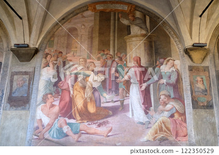 San Dominic frees an obsessed from the Demon, fresco by Lorenzo Sciorina in the cloister of Santa Maria Novella Principal Dominican church in Florence, Italy San Dominic frees an obsessed from the Demon, fresco by Lorenzo Sciorina in the cloister of Santa Maria Novella Principal Dominican church in Florence, Italy 122350529