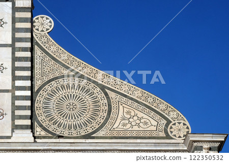 Detail from facade of Santa Maria Novella Dominican church in Florence, Italy 122350532