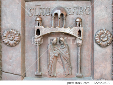 Visitation of the Virgin Mary on the San Ranieri gate of the Cathedral St. Mary of the Assumption in Pisa, Italy Visitation of the Virgin Mary on the San Ranieri gate of the Cathedral St. Mary of the Assumption in Pisa, Italy 122350699