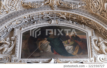 14th Stations of the Cross, Jesus is laid in the tomb and covered in incense, fragment of the dome in Salzburg Cathedral 14th Stations of the Cross, Jesus is laid in the tomb and covered in incense, fragment of the dome in Salzburg Cathedral 122350727