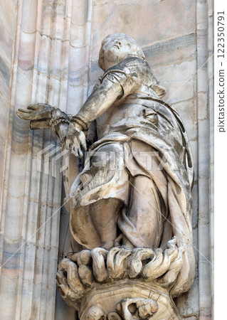 Statue of Saint on the facade of the Milan Cathedral, Duomo di Santa Maria Nascente, Milan, Lombardy, Italy 122350791