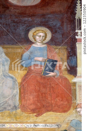 Saint John Evangelist, detail of the Triumph of St. Thomas Aquinas, fresco by Andrea di Buonaiuto, Spanish Chapel in Santa Maria Novella Principal Dominican church in Florence, Italy 122350904