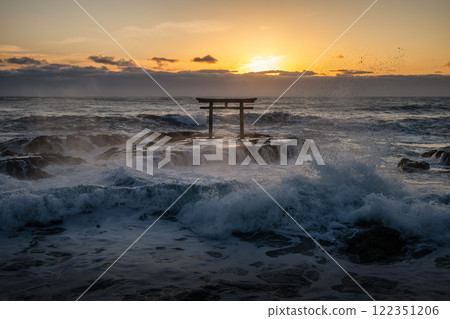The torii gate of Oarai Isosaki Shrine in the middle of a stormy winter 122351206