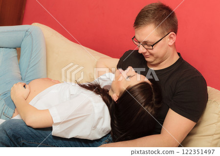 Pregnant woman with her man husband Pregnant woman with her man husband 122351497