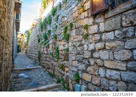 Narrow street in Ulcinj Old Town in Montenegro, the southernmost city at Montenegrin coast, Europe 122351654