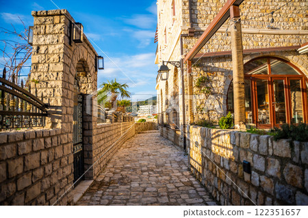 Narrow street in Ulcinj Old Town in Montenegro, the southernmost city at Montenegrin coast, Europe Narrow street in Ulcinj Old Town in Montenegro, the southernmost city at Montenegrin coast, Europe 122351657