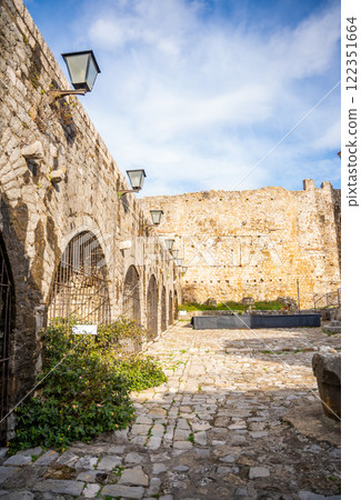 Street view of the Archaeological Museum or Local History Museum in Ulcinj Old Town or Stari Grad in Ulcinj, Montenegro. Street view of the Archaeological Museum or Local History Museum in Ulcinj Old Town or Stari Grad in Ulcinj, Montenegro. 122351664