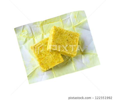 Broth cubes isolated on a white background. Top view. Chicken stock concentrate isolated. Broth cubes isolated on a white background. Top view. Chicken stock concentrate isolated. 122351992