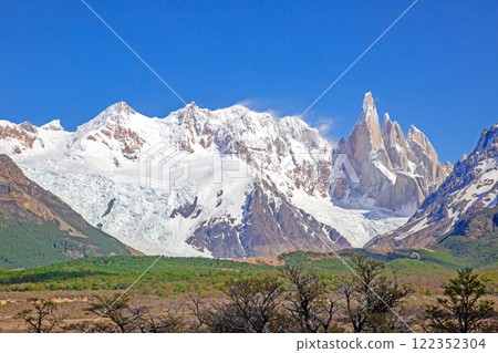 View of the valley towards Laguna Torre with Cerro Torre and surrounding peaks View of the valley towards Laguna Torre with Cerro Torre and surrounding peaks 122352304